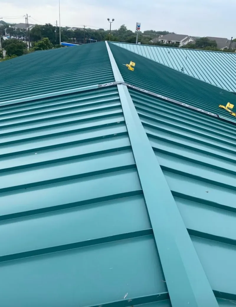 Green commercial metal roof ridge and valley for Metal Roof Repair in Fish Hawk